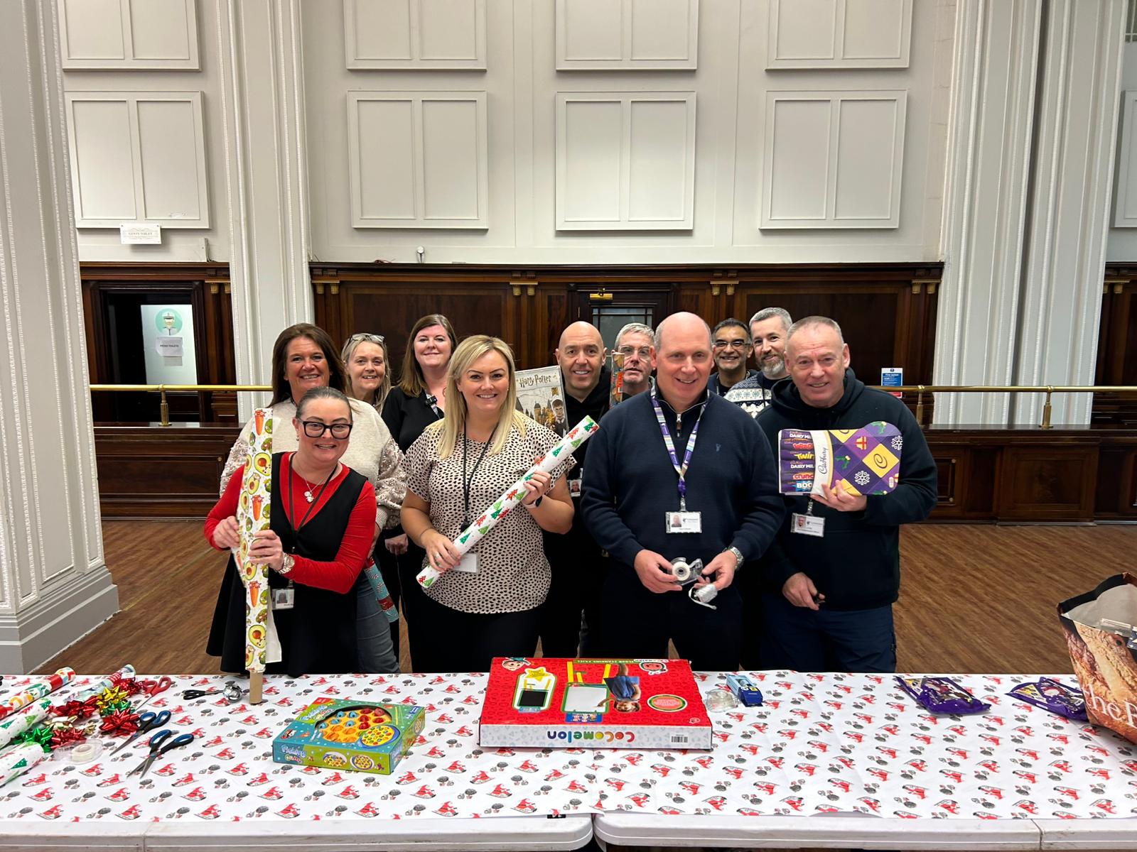Volunteers preparing gifts
